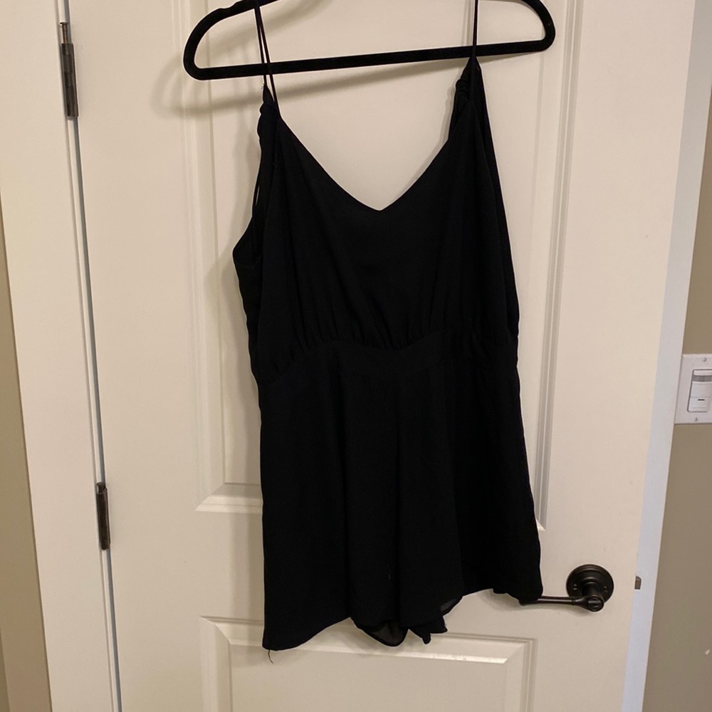 Black romper! Super cute and light. Recommend wearing with no bra if comfortable
